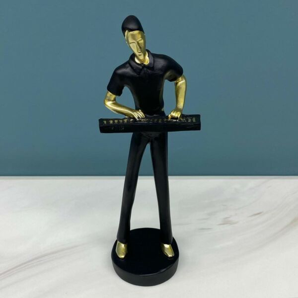 تحفة موسيقار عازف أورغ - أسود وذهبي