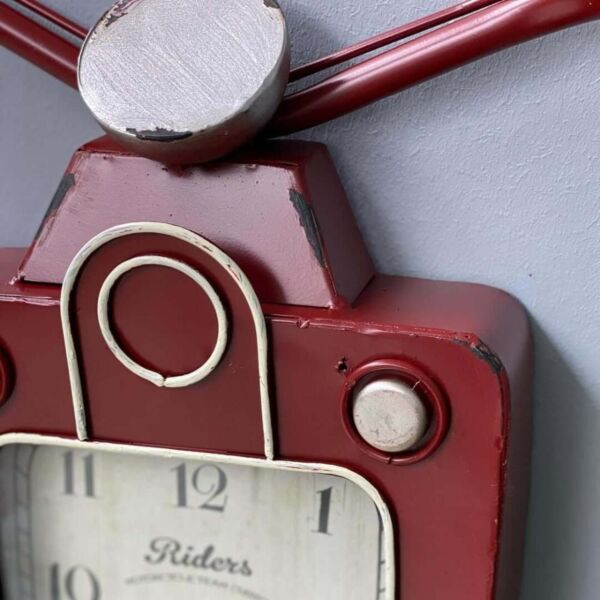 ساعة جدارية موتو